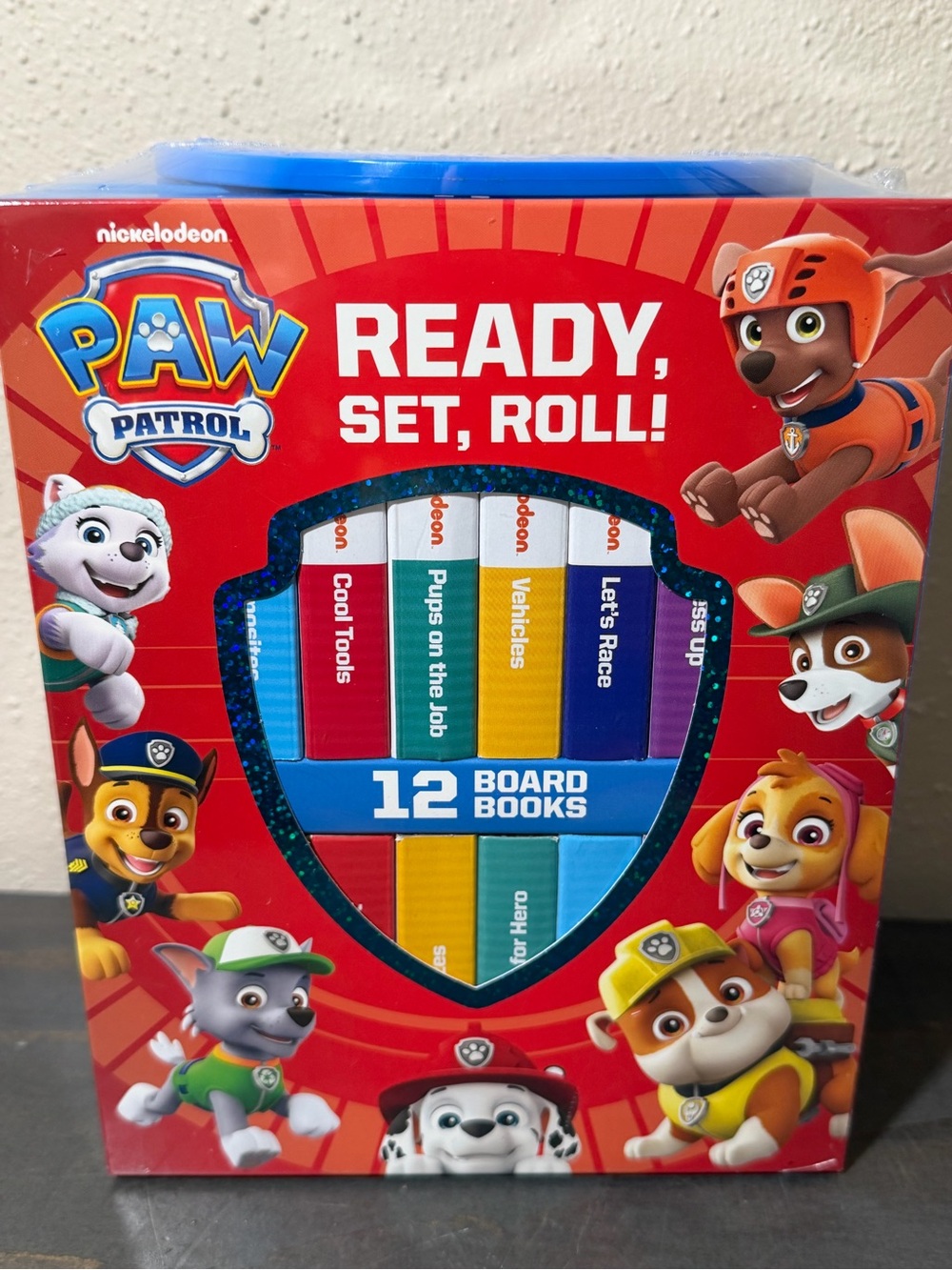 Paw Patrol Ready, Set, Roll! 12-Book Board Book Set - 🆕